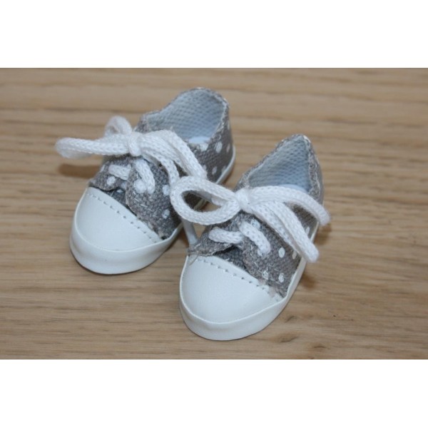 Chaussures de sport grises à pois blancs 