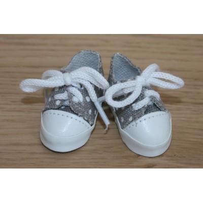 Chaussures de sport grises à pois blancs 