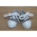 Chaussures de sport grises à pois blancs 