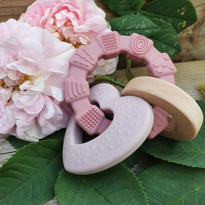 Pink heart-shaped silicone and wood teething toy - Summerville Organic